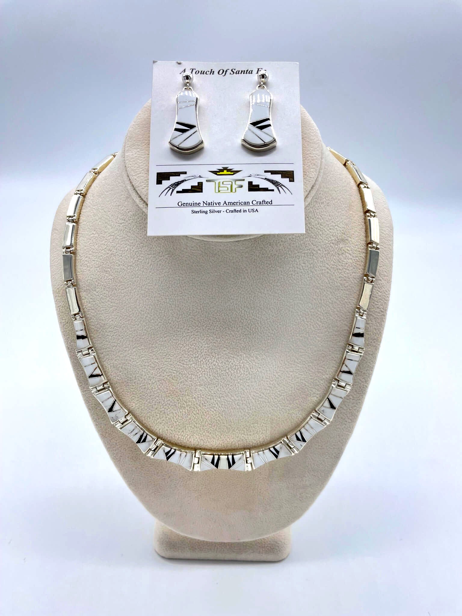 Curved White Buffalo and onyx inlaid on sterling silver