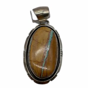 Oval Boulder Turquoise And Sterling Silver Pendant