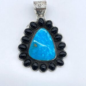 Triangle Shaped Sleeping Beauty Turquoise And Black Onyx on Sterling Silver Clustered Pendant