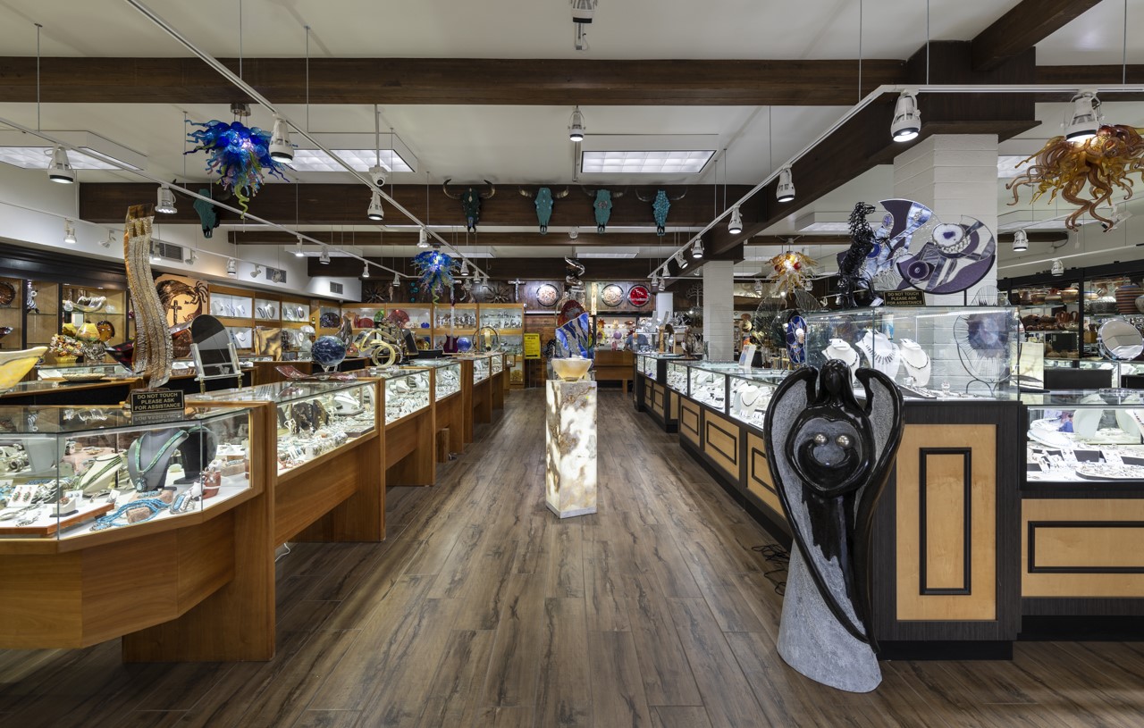 Inside Sunrise Jewelry & Gallery — jewelry cases and art in Old Town Scottsdale