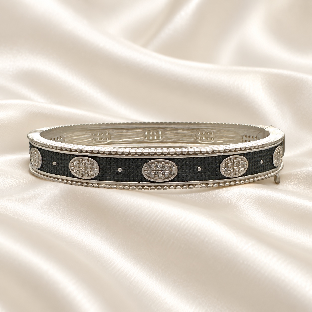 Freida Rothman Sterling Silver & Black Rhodium Oval Eternity Hinged Bangle Bracelet